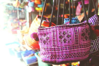 Close-up of illuminated lanterns for sale in market