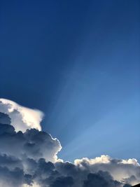 Low angle view of clouds in blue sky