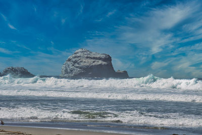 Built structure on beach against sky