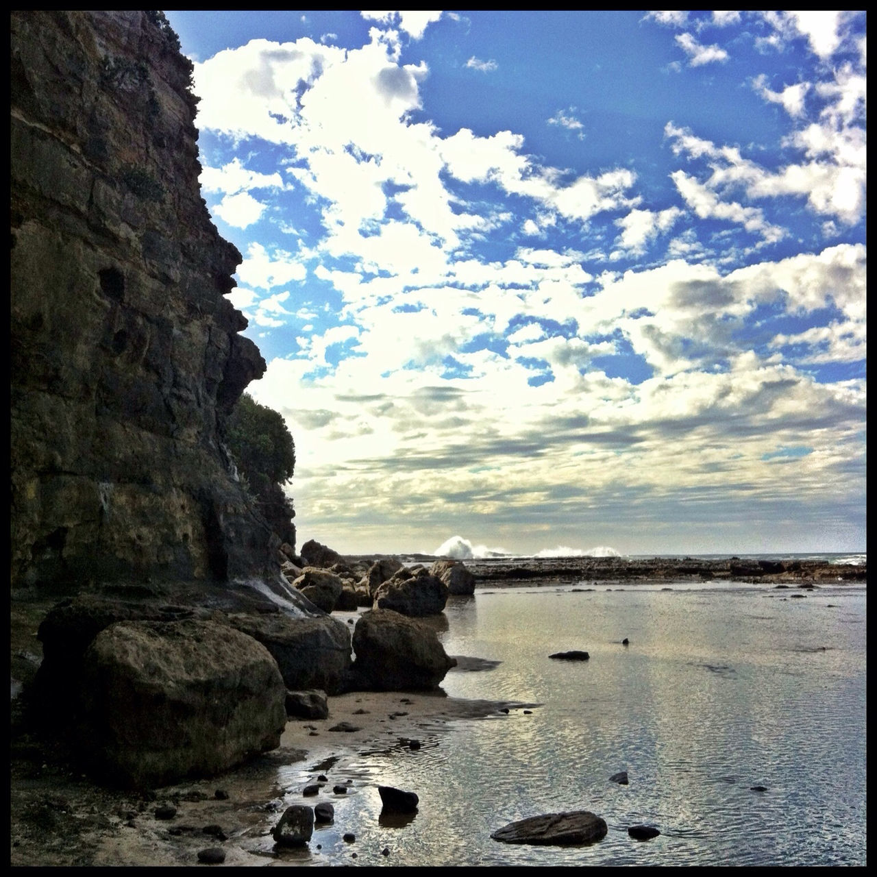 transfer print, water, sky, auto post production filter, sea, tranquil scene, tranquility, scenics, rock - object, beauty in nature, nature, cloud - sky, horizon over water, cloud, rock, idyllic, shore, outdoors, day, beach