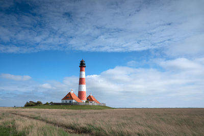 Panoramic image of westerhever lighthouse against sky, north frisia, germany