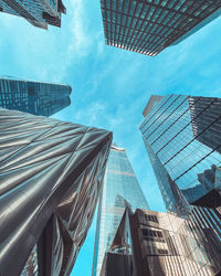 Low angle view of modern buildings against sky