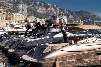 Boats moored at harbor