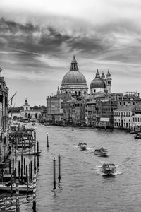 Black and white photo of some boats in the grand canal of venice italy europe