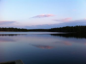 Reflection of clouds in calm lake