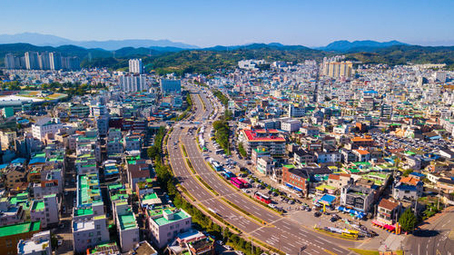 High angle view of city street against sky