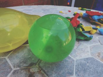 High angle view of multi colored balls on table
