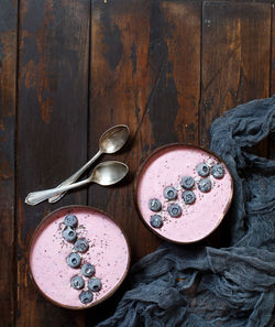 Directly above shot of yogurt in bowls on table