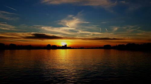 Scenic view of sea at sunset