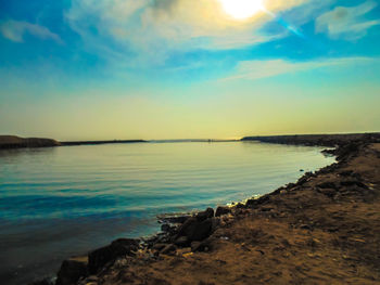 Scenic view of sea at sunset