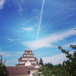 Low angle view of built structure against blue sky