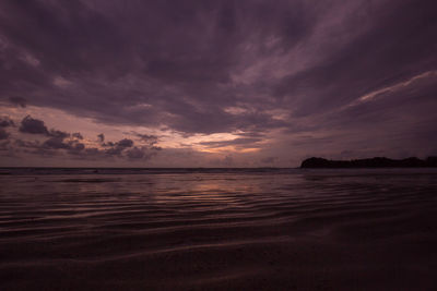 Scenic view of sea against sky at sunset