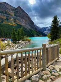 Scenic view of lake and mountains against sky