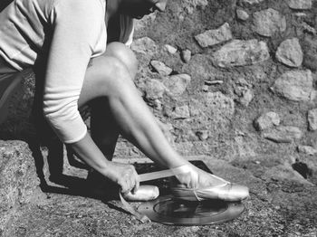 Close-up of young woman standing on ground