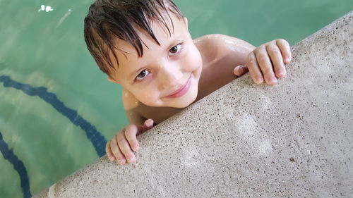 High angle view of boy in swimming pool