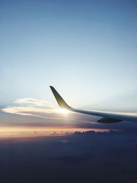 Cropped image of airplane wing