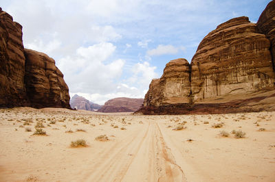 Rock formations in desert against sky