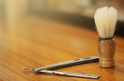 High angle view of paintbrushes on table