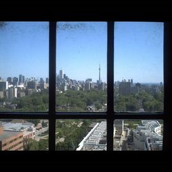 View of cityscape through window