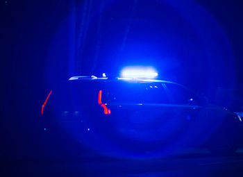 Close-up of illuminated lighting equipment in nightclub