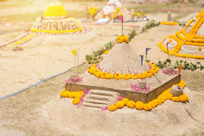High angle view of cake on sand