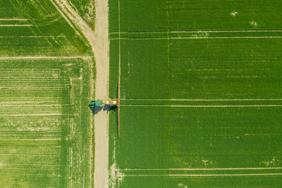 Aerial view of tractor on agricultural field