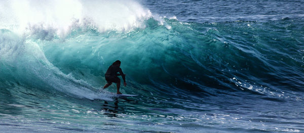 Scenic view of waves in sea