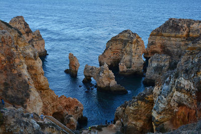 High angle view of rocks in sea