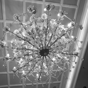 Low angle view of chandelier hanging from ceiling