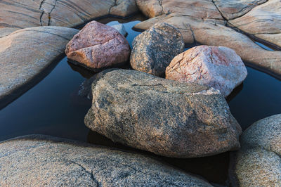 Stones lying in water, sweden