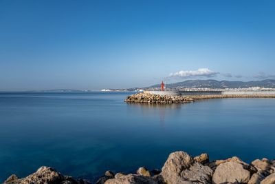 Scenic view of bay against sky