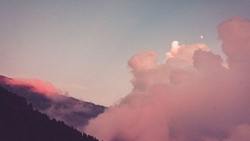 Low angle view of silhouette mountain against sky during sunset