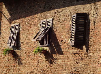 Low angle view of weathered wall