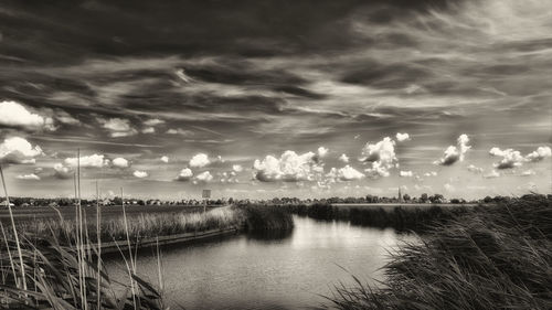 Scenic view of lake against sky