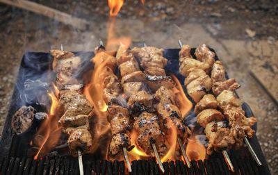 Close-up of meat on barbecue grill