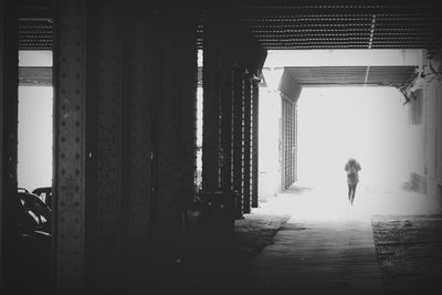 Full length of woman standing in building