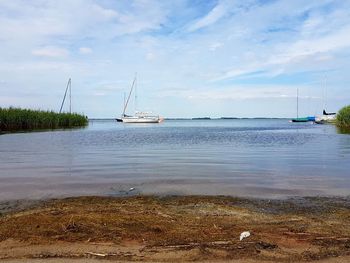 Scenic view of calm sea against sky