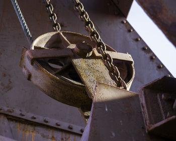 Low angle view of padlocks on chain