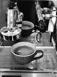 Close-up of coffee cup on table