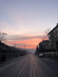 Road against sky during sunset