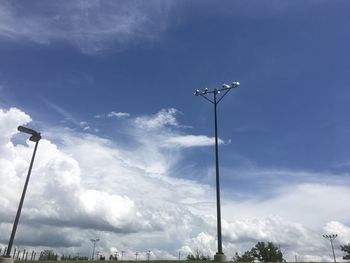 Low angle view of street light against sky