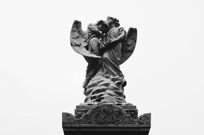 Low angle view of statue against clear sky