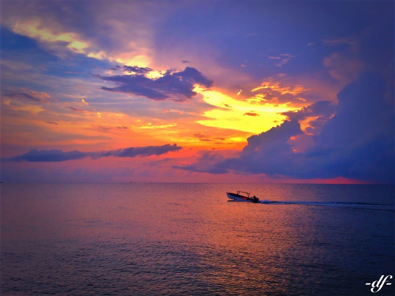 sea, sunset, water, sky, horizon over water, scenics, nautical vessel, tranquil scene, beauty in nature, tranquility, waterfront, cloud - sky, boat, transportation, mode of transport, nature, idyllic, orange color, cloud, cloudy