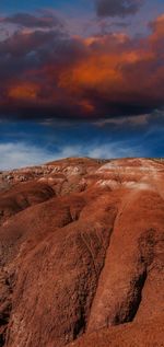 Scenic view of desert against sky during sunset