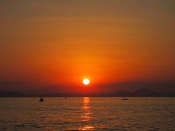 Scenic view of sunset over sea