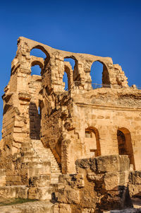 Old ruins of temple against clear sky