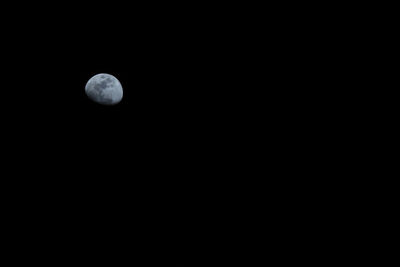 Scenic view of moon against clear sky at night