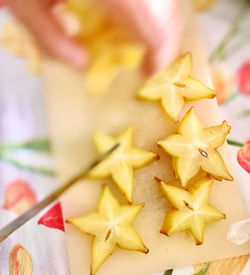 Close-up of star fruit on table