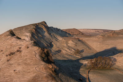 Scenic view of desert against clear sky