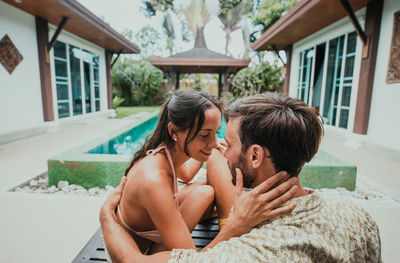 Couple kissing outdoors